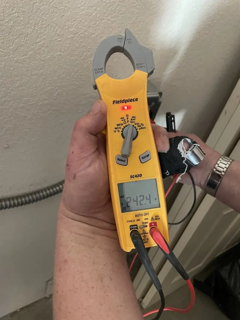 Voltage testing with clamp meter during Aluminum Wiring Replacement in Red Bank
